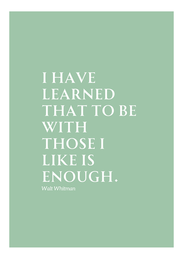 This image features a minimalist design with a sage green background and white text. The quote "I HAVE LEARNED THAT TO BE WITH THOSE I LIKE IS ENOUGH." is prominently displayed in an elegant serif font. Below the quote, the attribution "Walt Whitman" is written in a smaller size, maintaining the same clean and refined style.